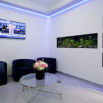 Reception waiting room and fish tank set into the wall